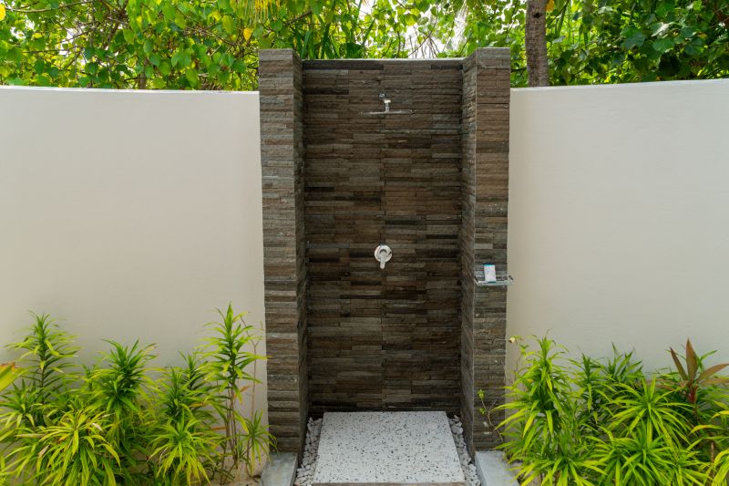 Open Concept Shower with Natural Stone Walls